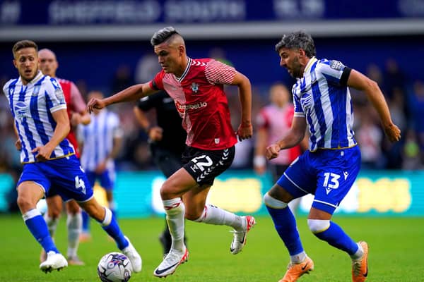 Southampton's Carlos Alcaraz and Sheffield Wednesday's Callum Paterson (right) battle for the ball during the Sky Bet Championship match at Hillsborough, Sheffield. Picture date: Friday August 4, 2023. PA Photo. See PA story SOCCER Sheff Wed. Photo credit should read: Nick Potts/PA Wire.

RESTRICTIONS: EDITORIAL USE ONLY No use with unauthorised audio, video, data, fixture lists, club/league logos or "live" services. Online in-match use limited to 120 images, no video emulation. No use in betting, games or single club/league/player publications.