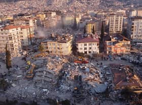 An aerial photo shows collapsed buildings in Antakya on February 11, 2023, after a 7.8-magnitude earthquake struck the country's southeast  (Photo by Hassan AYADI / AFP) (Photo by HASSAN AYADI/AFP via Getty Images)