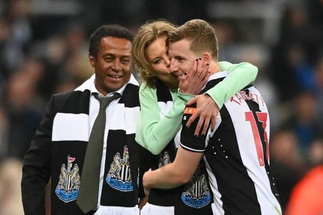 Amanda Staveley, Director of Newcastle United gives Matt Targett of Newcastle United a kiss following their victory in the Premier League match between Newcastle United and Arsenal at St. James Park on May 16, 2022 in Newcastle upon Tyne, England. (Photo by Stu Forster/Getty Images)
