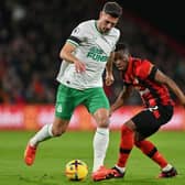 Bournemouth's Ivory Coast midfielder Hamed Traore (R) vies with Newcastle United's Swiss defender Fabian Schar during the English Premier League football match between Bournemouth and Newcastle United at the Vitality Stadium in Bournemouth, southern England on February 11, 2023. (Photo by GLYN KIRK/AFP via Getty Images)