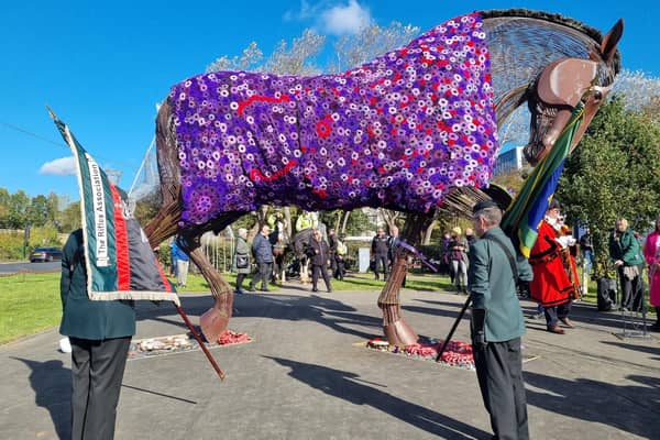 Watch as War Horse memorial gets purple poppy coat to remember fallen service animals