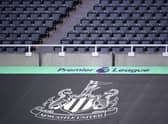 NEWCASTLE UPON TYNE, ENGLAND - JULY 05: General view inside the stadium where a Newcastle United banner is seen alongside the Premier League logo  (Photo by Laurence Griffiths/Getty Images)