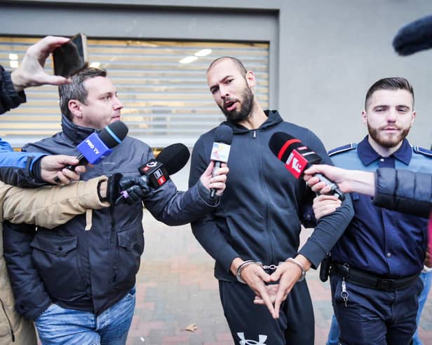 According to one poll, more than a quarter of young men have a favourable opinion of social media misogynist Andrew Tate, currently under house arrest in Romania amid an investigation into human trafficking (Picture: Mihai Barbu/AFP via Getty Images)