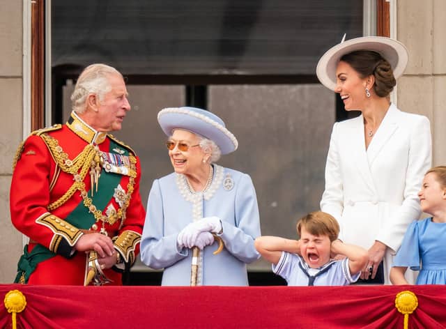 Then Prince of Wales (now King Charles III), Queen Elizabeth II, Prince Louis, the then Duchess of Cambridge (now the Princess of Wales)and Princess Charlotte on the balcony of Buckingham Palace after the Trooping the Colour ceremony at Horse Guards Parade, central London.