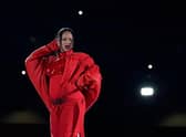 Barbadian singer Rihanna performs during the halftime show of Super Bowl LVII between the Kansas City Chiefs and the Philadelphia Eagles at State Farm Stadium in Glendale, Arizona, on February 12, 2023. (Photo by TIMOTHY A. CLARY/AFP via Getty Images)